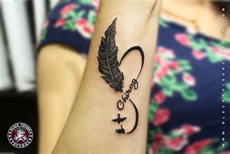 feather tattoo with name inside|The Ultimate Guide to Feather Tattoos & Their Meaning.